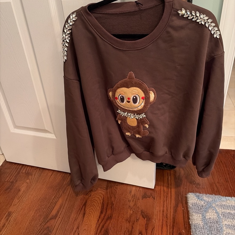 Labubu

Brown Embellished Monkey Sweatshirt